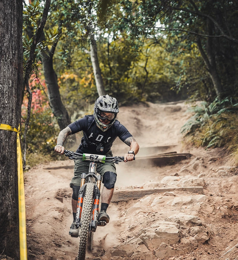 A Joaquin Miller Park Enduro racer racing down Stage 2: Chaparral Trail.